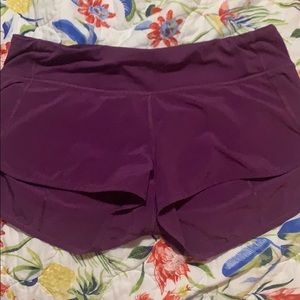 Size 6 purple LULULEMON shorts.